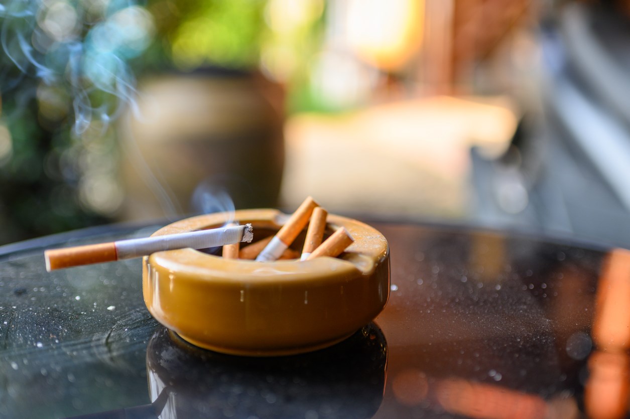 Cigarettes in an ash tray.